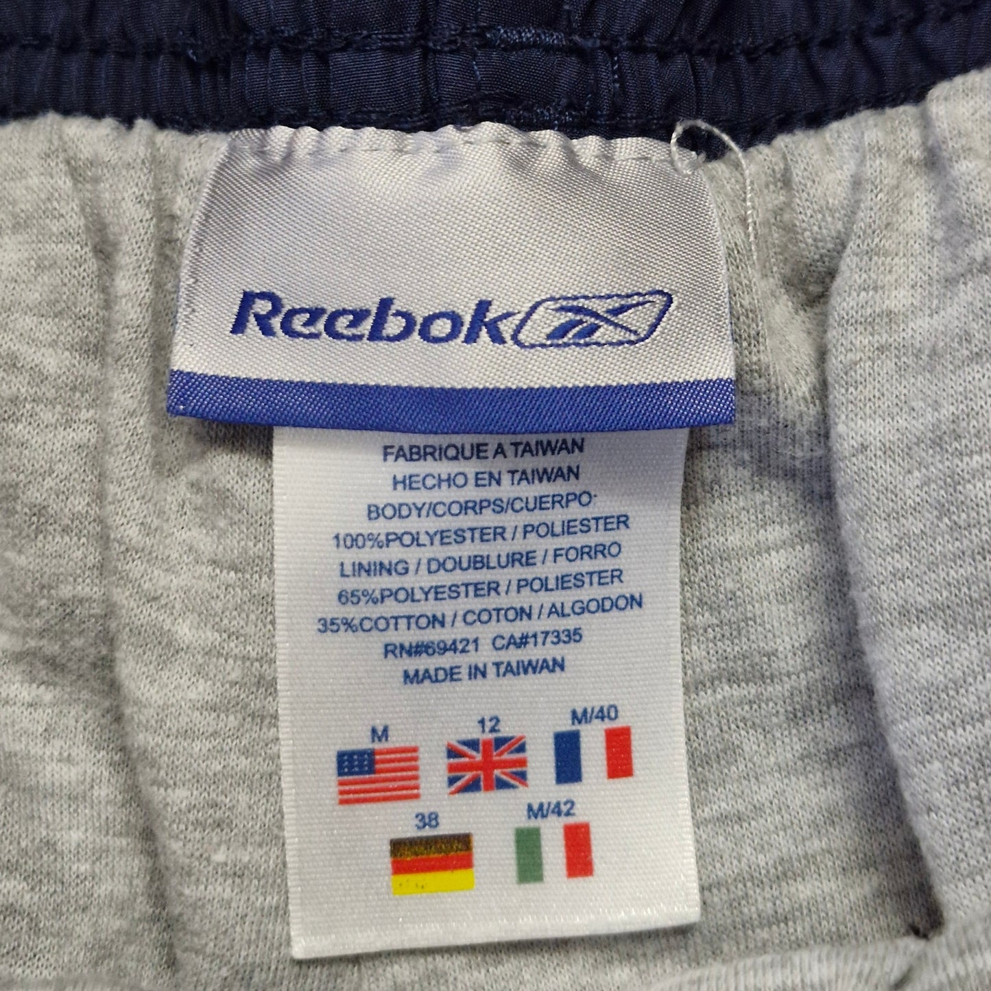 Reebok Navy Blue Windbreaker Pants Women's Size s Purple Side Stripes